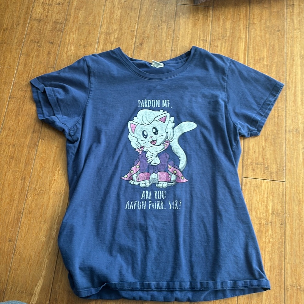 This is a navy blue port and company Hamilton shirt. It is a women’s medium.